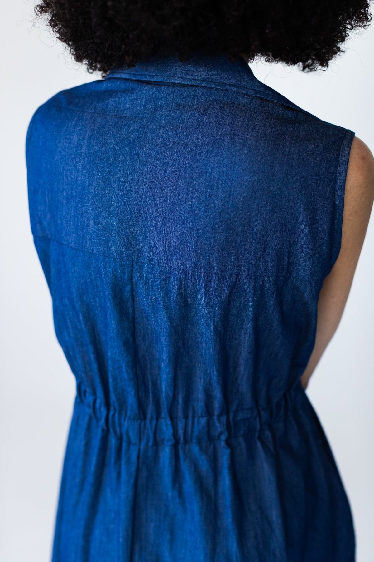 Sutton denim shirt-dress, close-up back view of yoke and elasticated waist