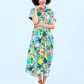 Quinn fit and flare dress in mint lemon print, front view full length with hand at chin