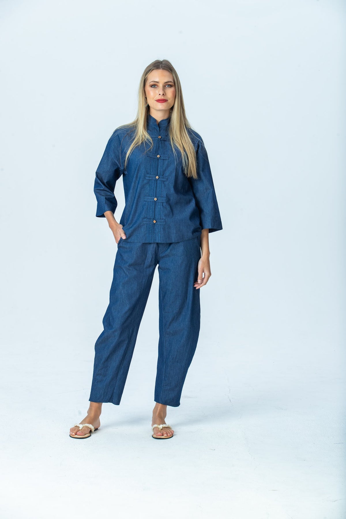 Parker denim barrel pants, front view full length with hand in pocket