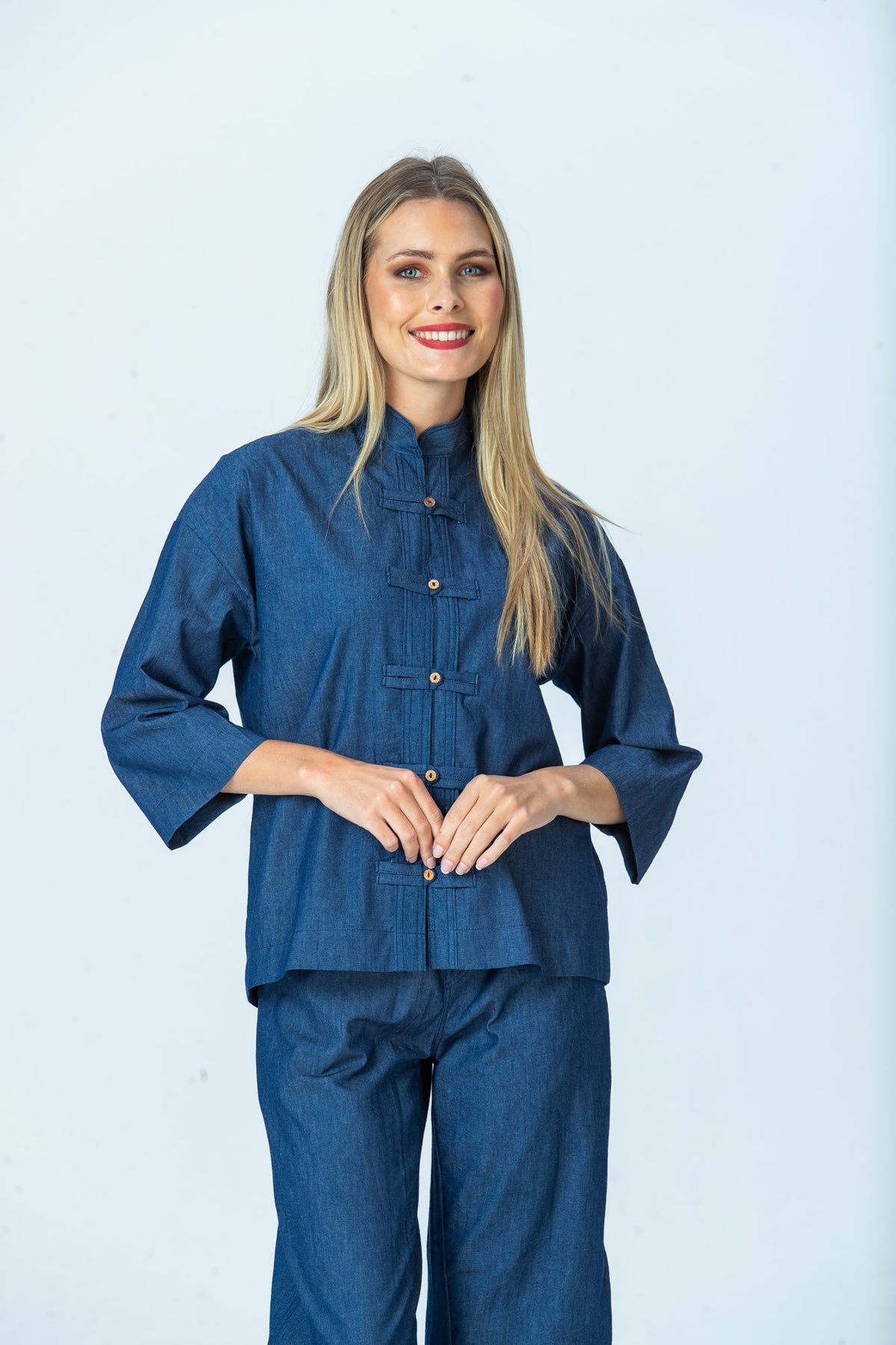 Kinsley denim kaftan-style shirt, front view with hands together