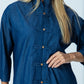 Kinsley denim kaftan shirt, close up of frog fastenings and red thread on the final fastening