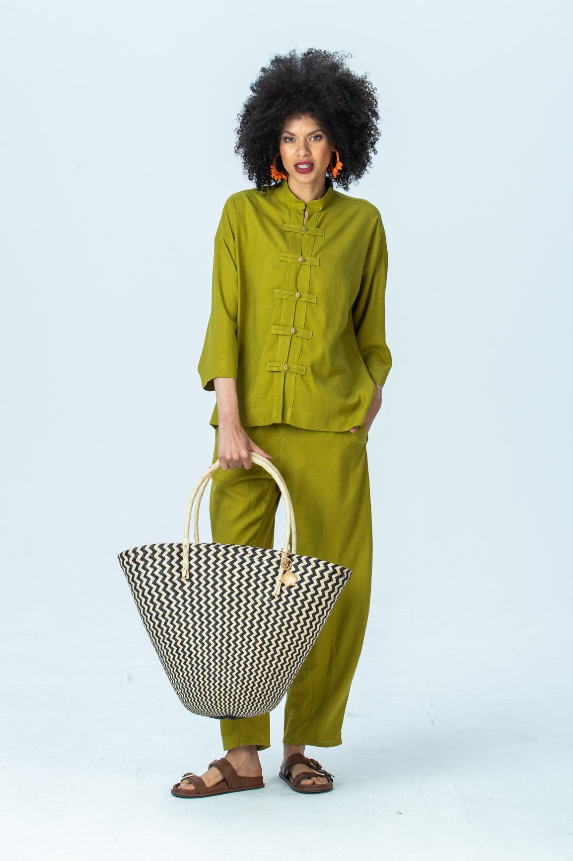 Kinsley chartreuse kaftan-style shirt, front view full length with matching Parker pants