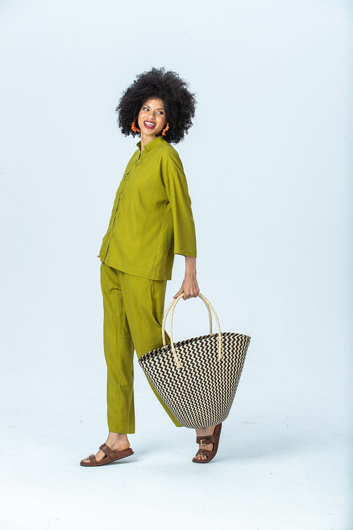 Parker chartreuse barrel pants, side view full length walking