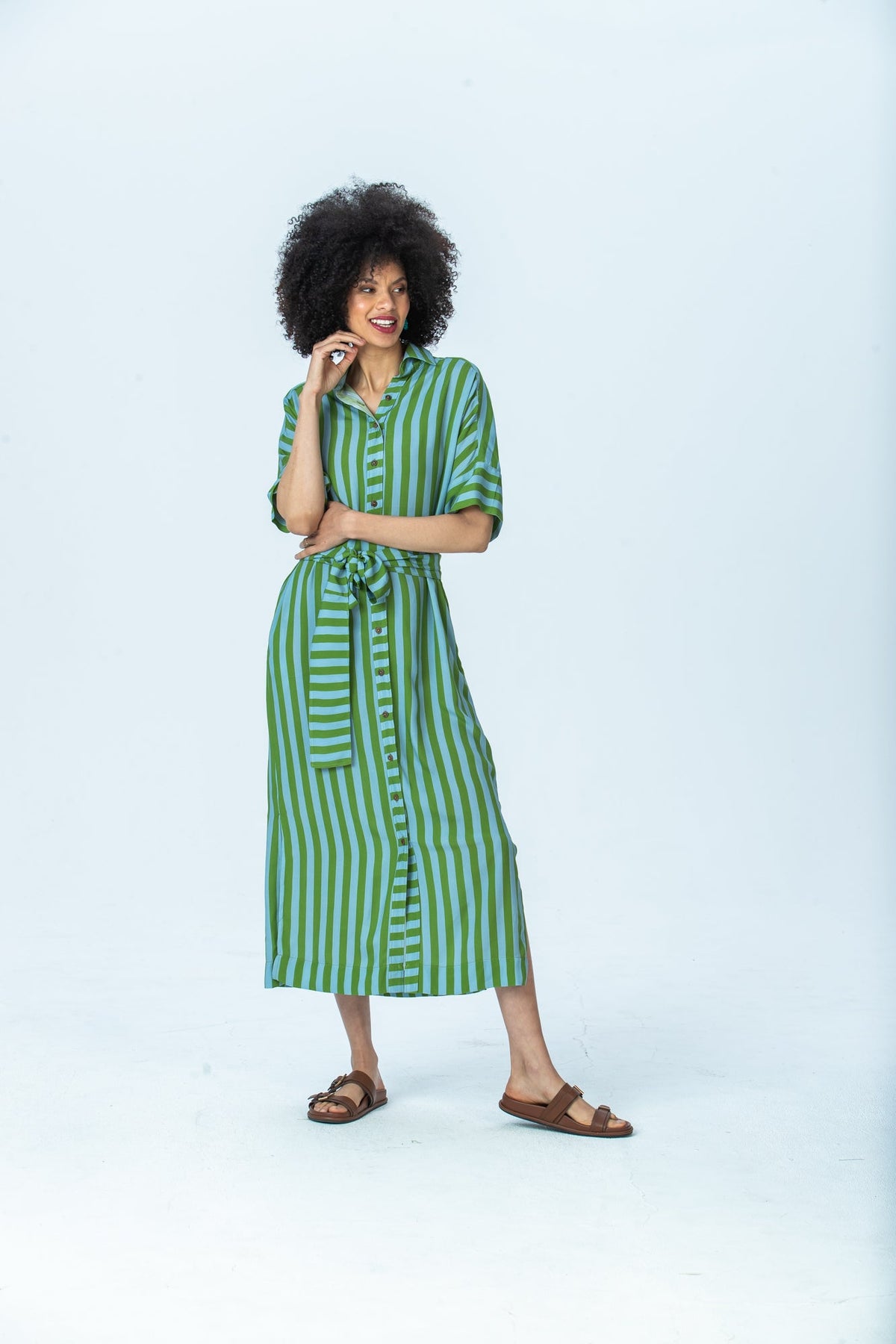 Hollis blue green stripe shirt dress, front view full length, looking to the side