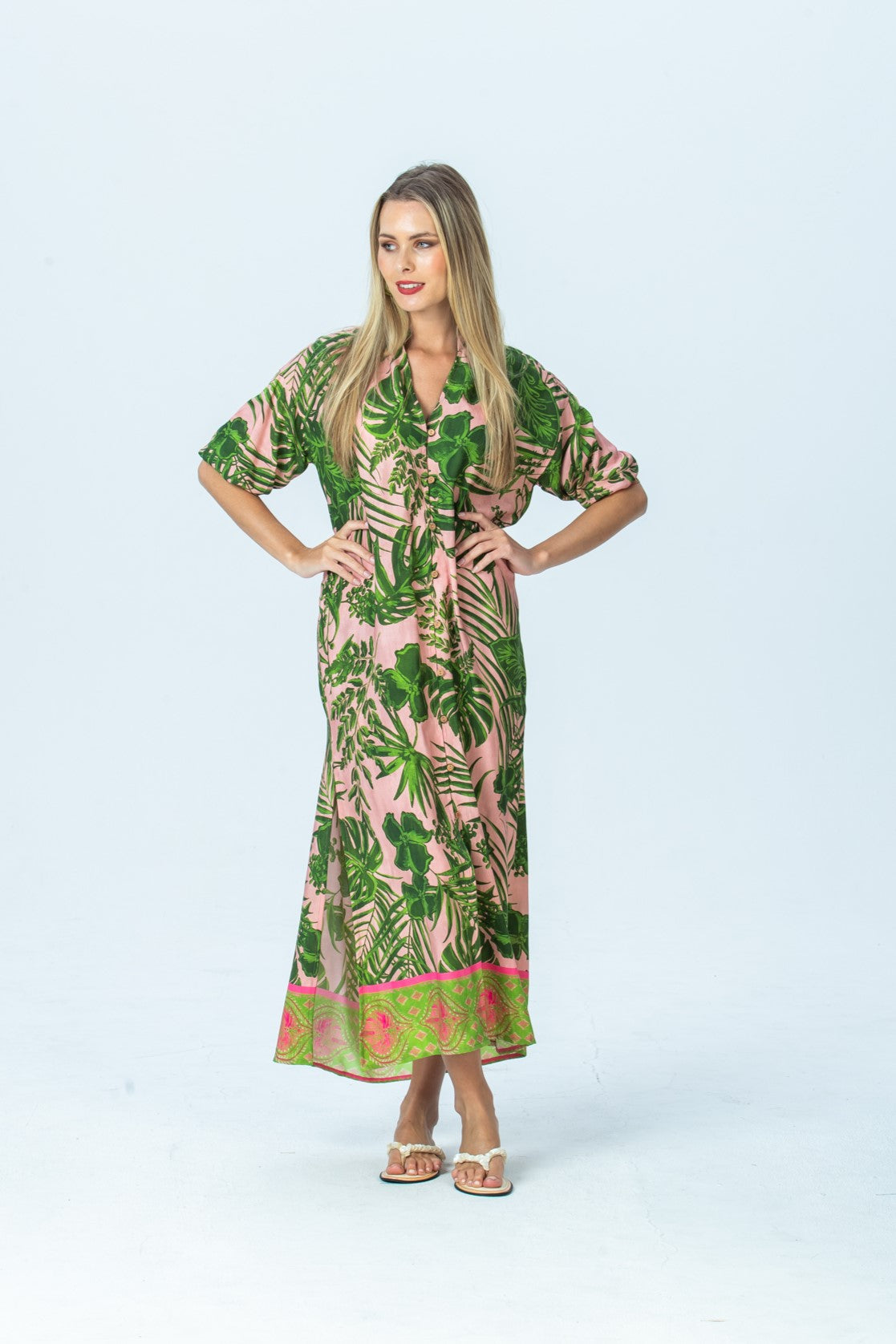 Bailey pink tropical kaftan, front view full length looking to the side