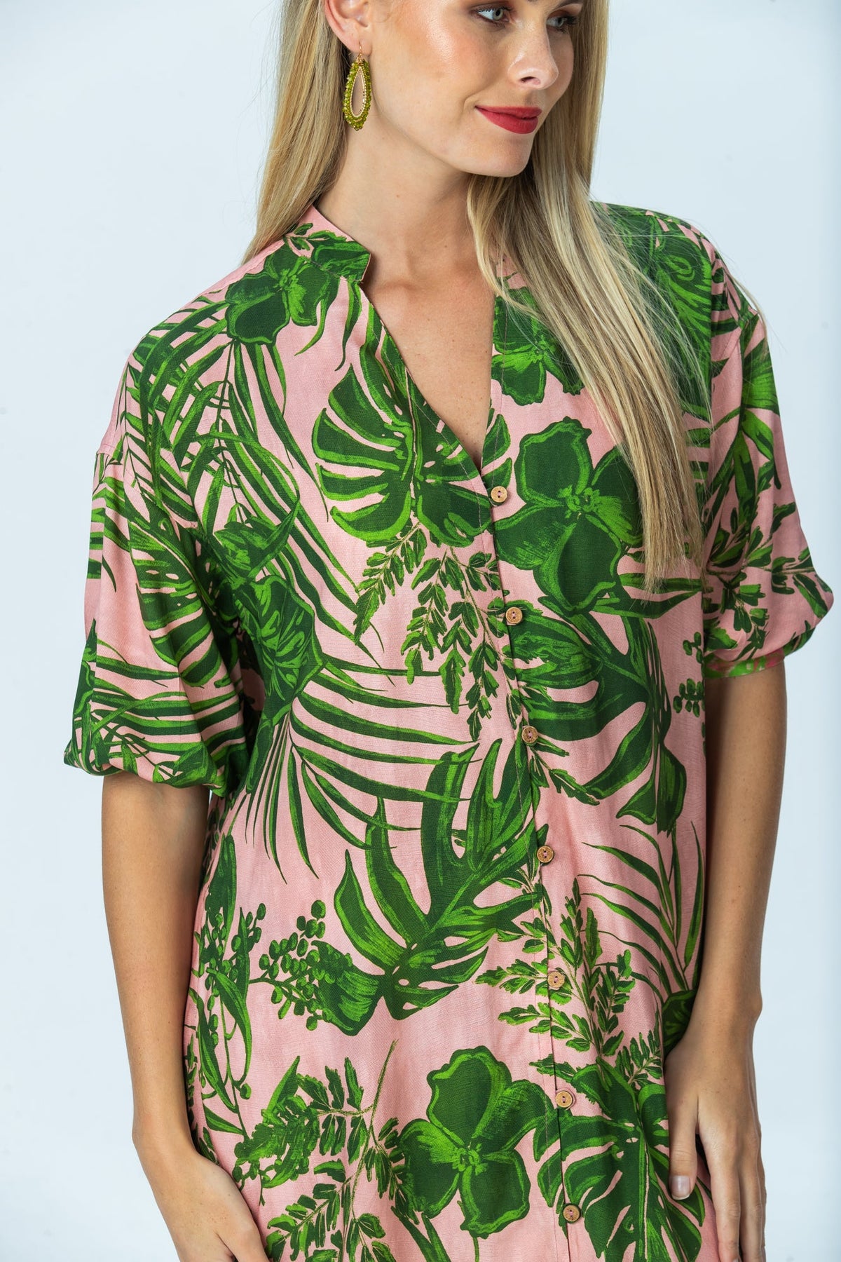 Bailey pink tropical kaftan, close up of stand collar and wooden buttons