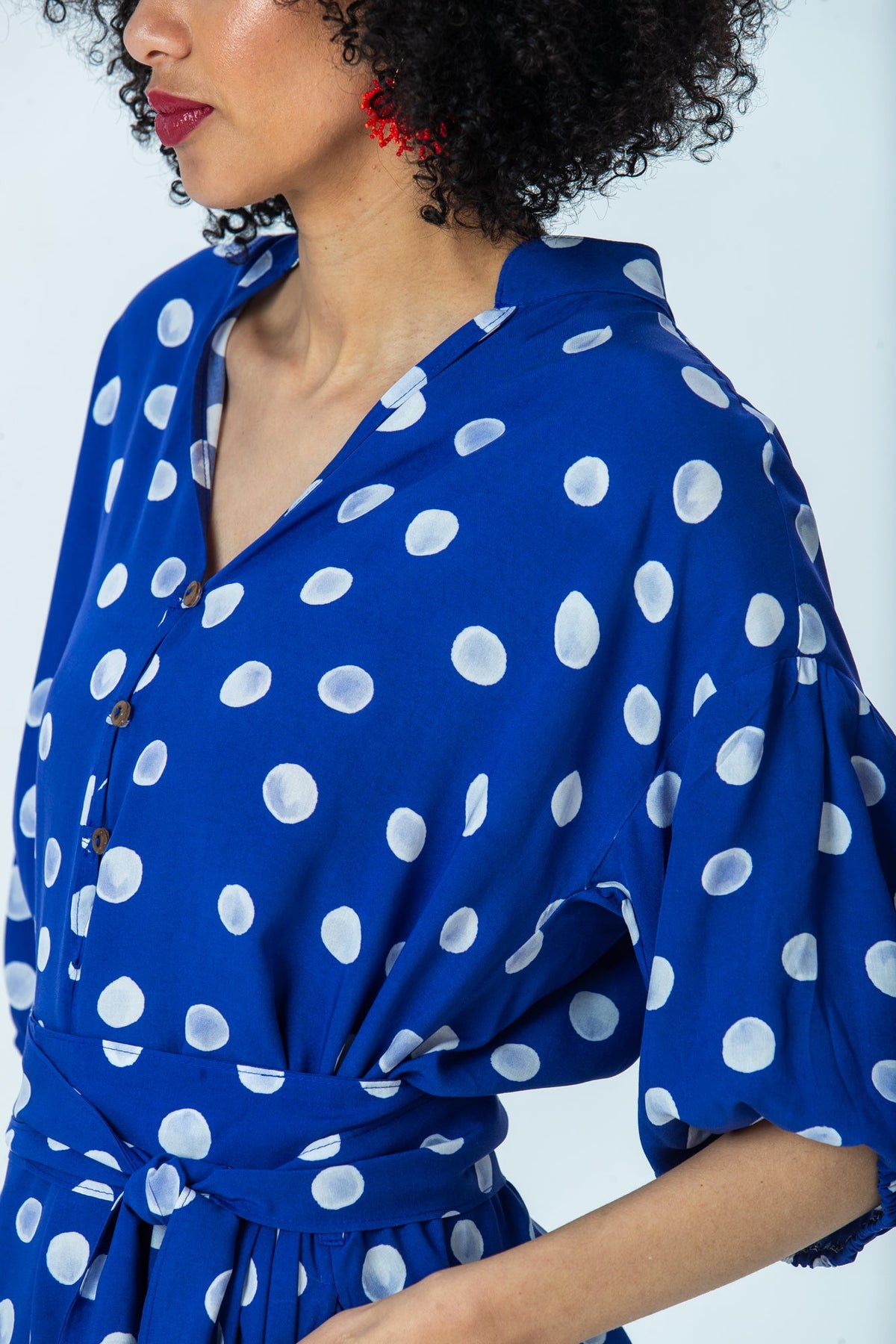 Sloane royal blue polka dot dress, close up of mandarin collar and gauged sleeve