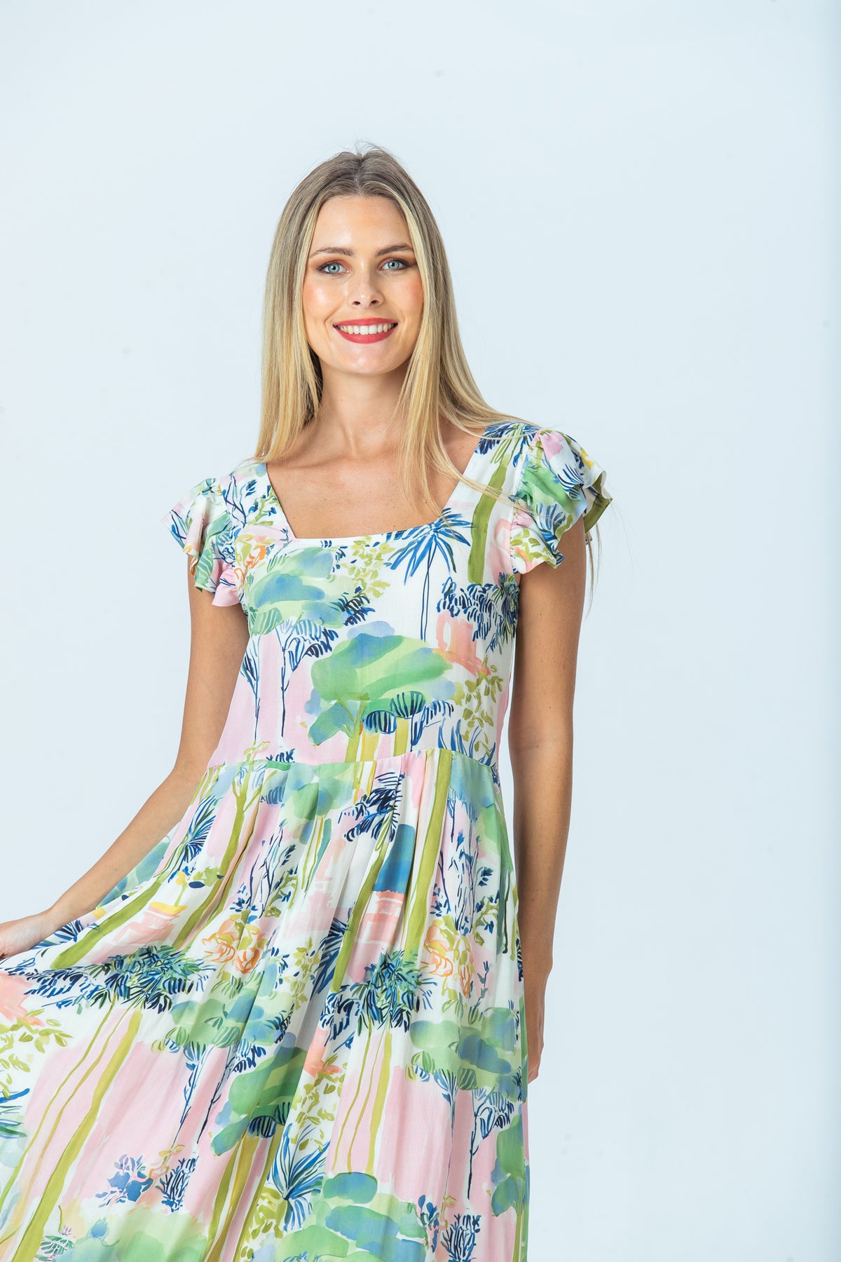 Sienna flutter sleeve sundress, front view holding out the skirt