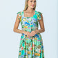 Sienna mint lemon sundress, front view with hands together