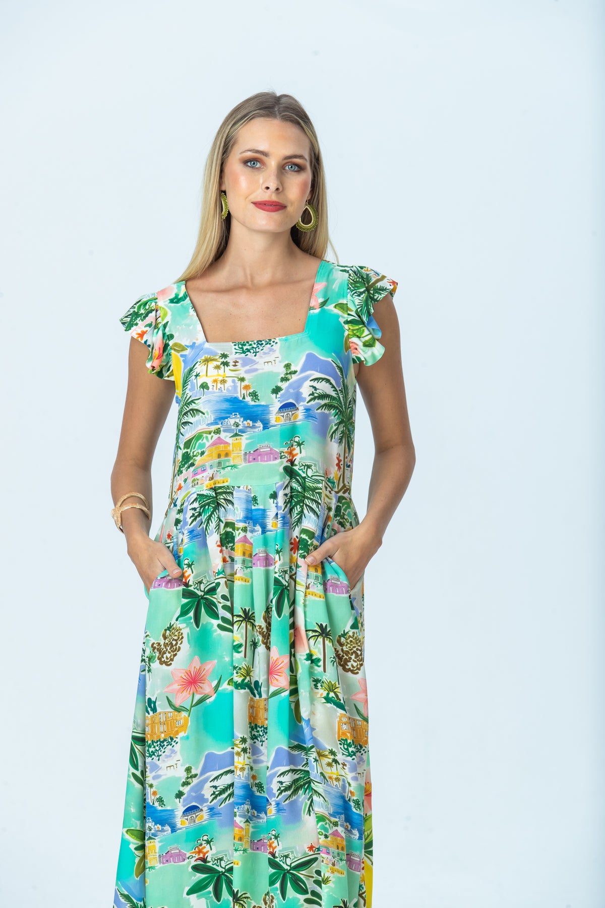 Sienna mint lemon sundress, front view with hands in pockets