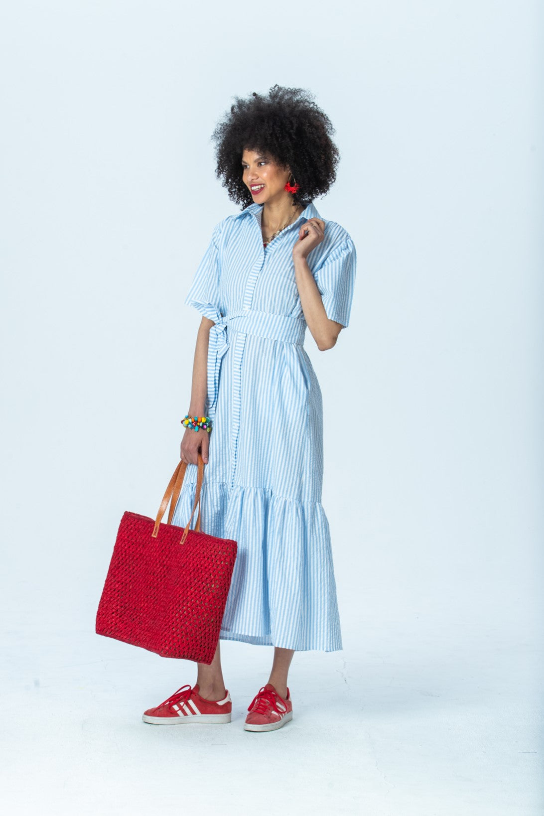 Frankie blue stripe shirt dress, three-quarter view full length with hand at collar