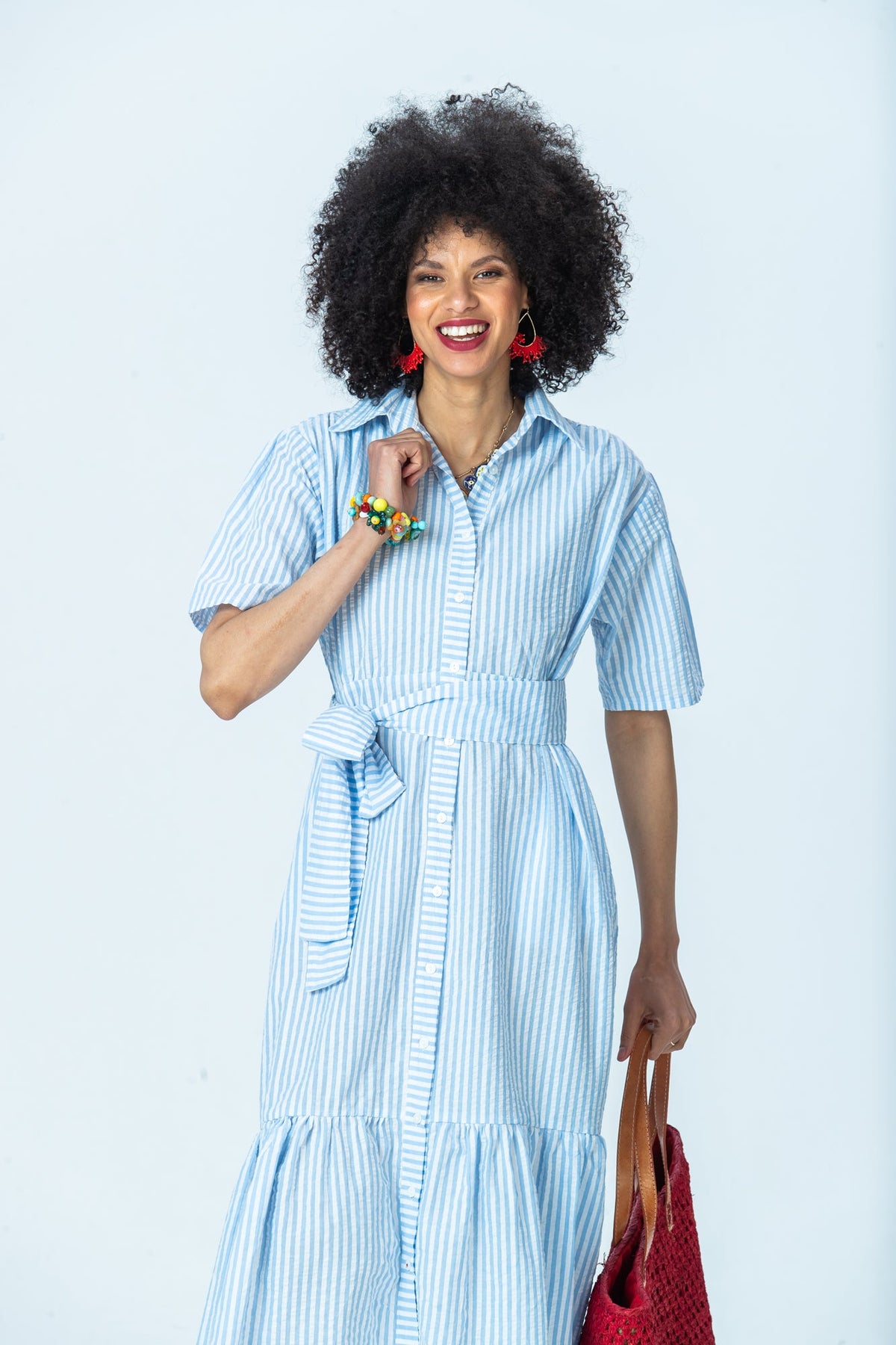 Frankie blue stripe shirt dress, front view, belted, with hand at collar