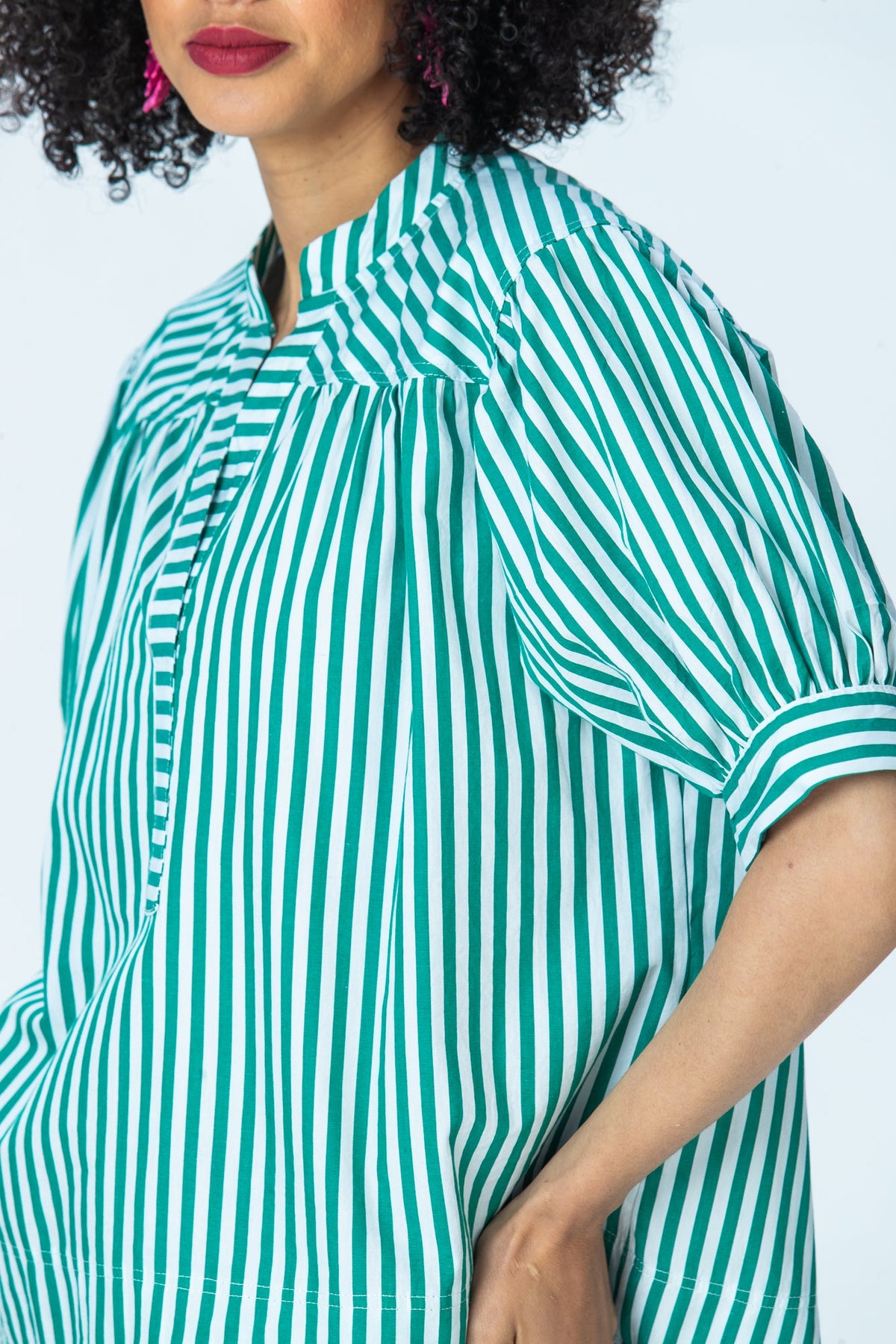 Tatum emerald stripe shirt, angled close up of placket and gathered sleeve