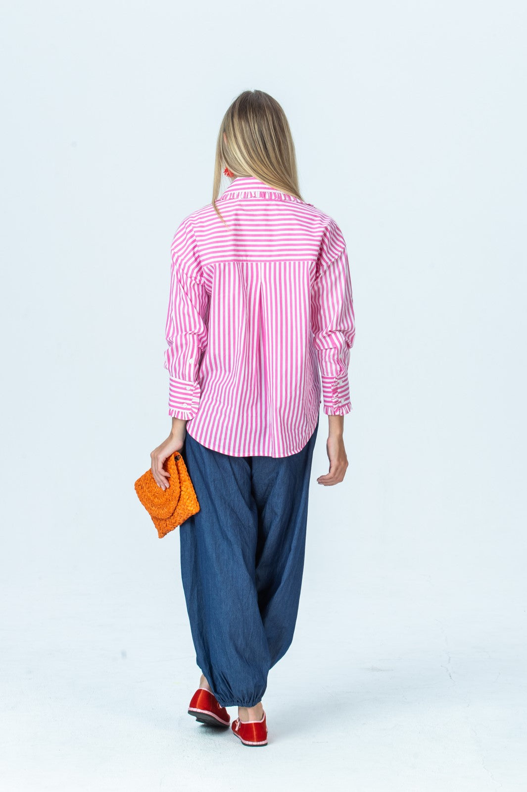 Claire frill shirt, full-length back view showing yoke and centre pleat, styled with Stella balloon pants