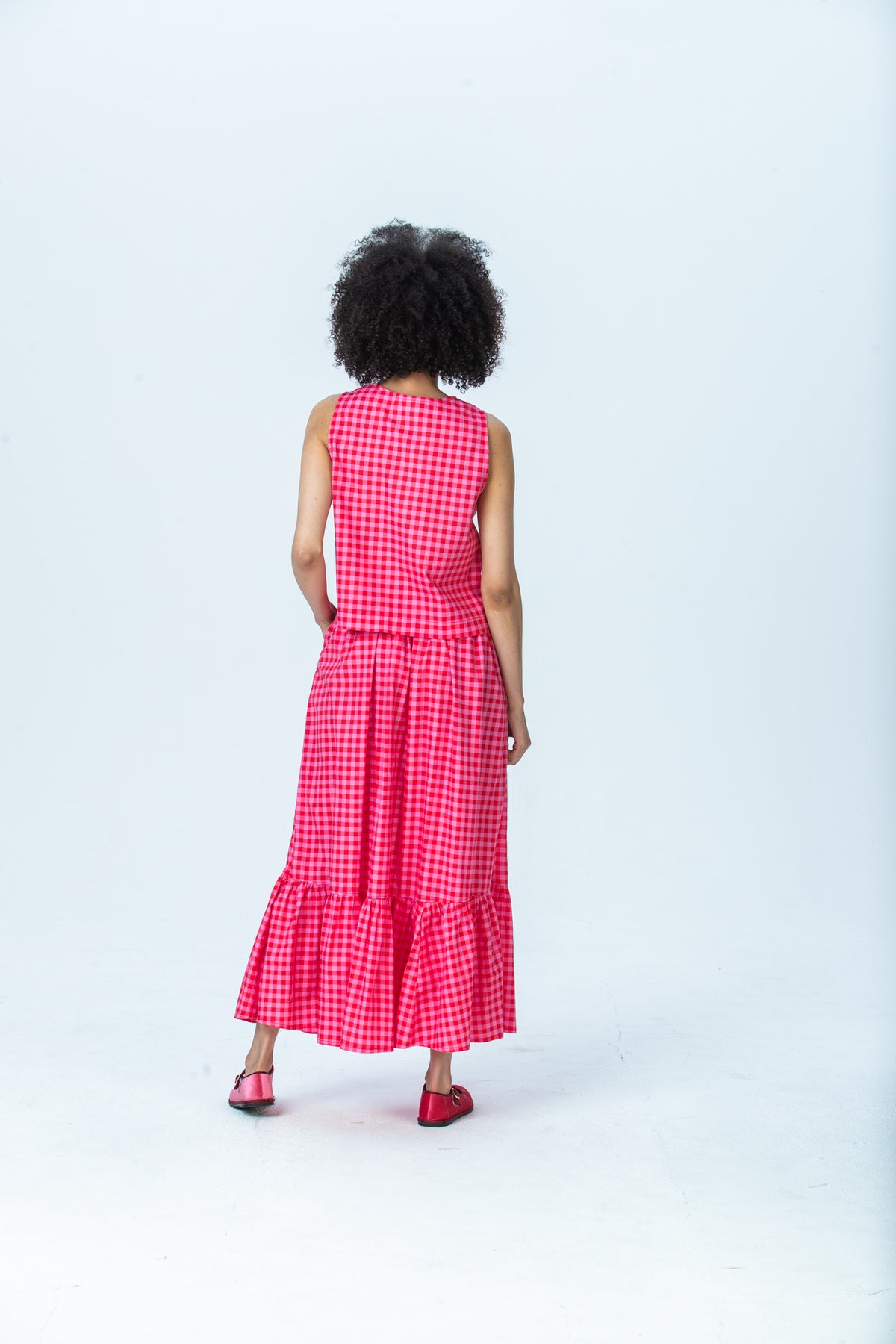 Riley red and pink check skirt, back view full length