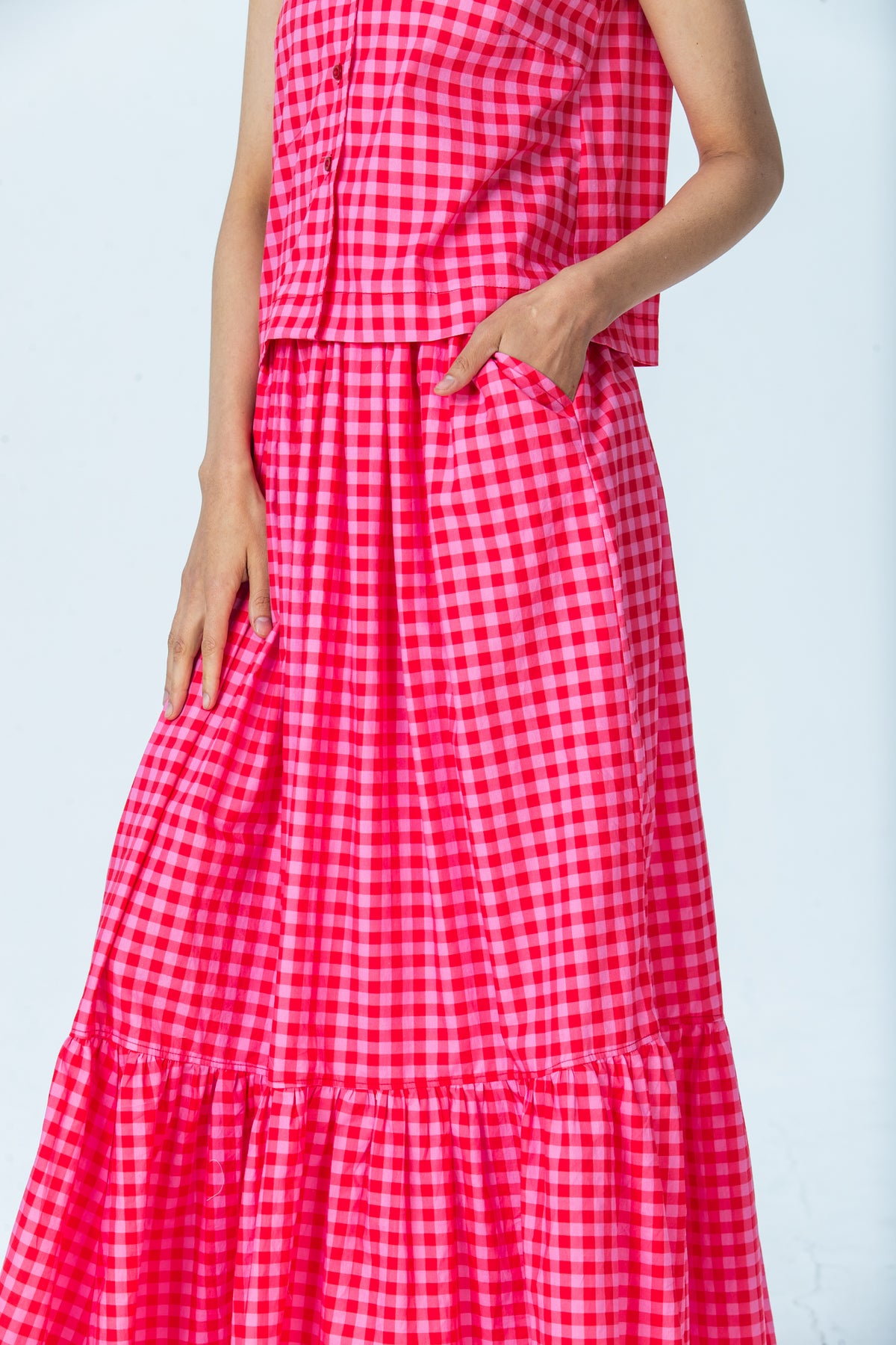 Riley red and pink check skirt, close up of pocket and gathered skirt