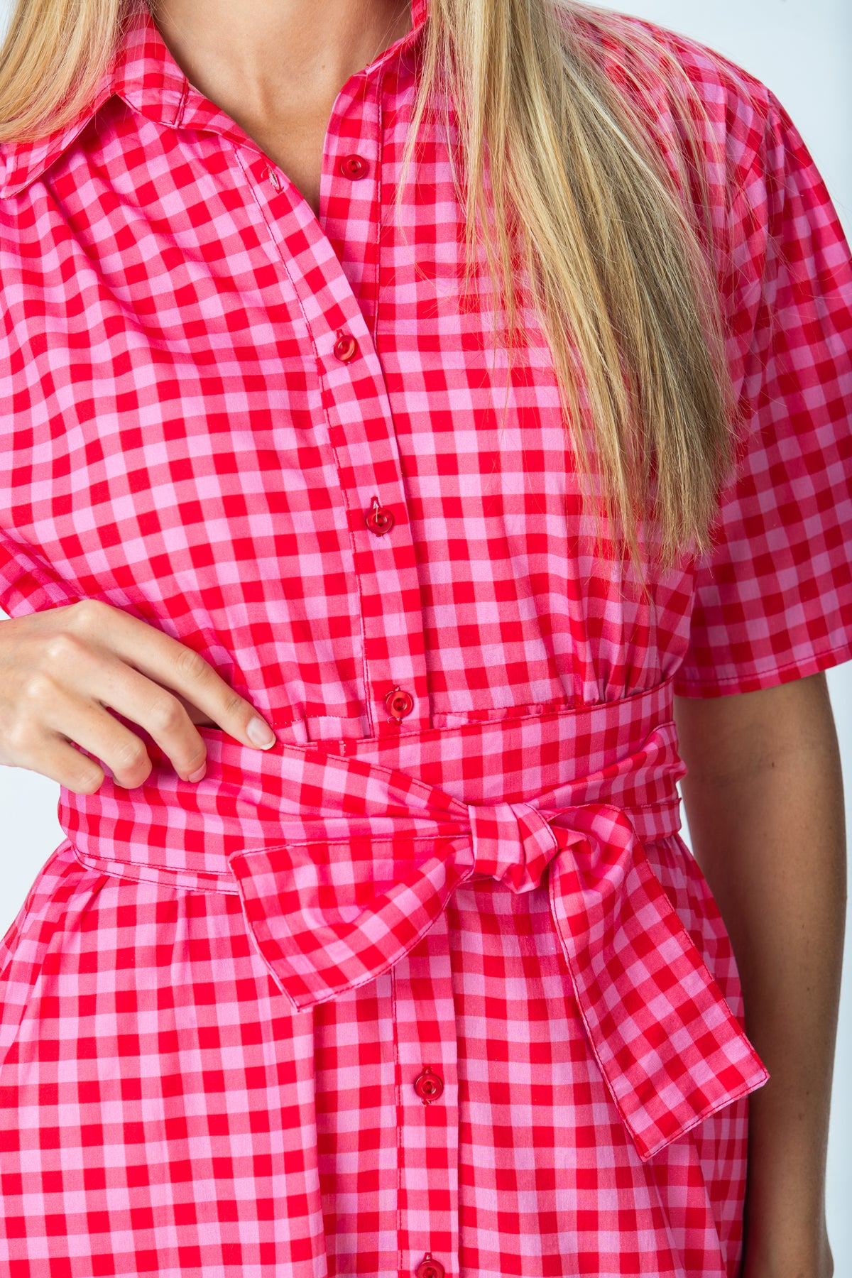 Frankie red and pink check shirt dress, close up of placket buttons and belt