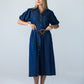 Harlow denim shirt dress in 100% cotton showing hands on belt