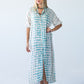 Bailey teal brushstroke kaftan, front view with hand on hip