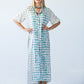 Bailey teal brushstroke kaftan, front view with hands on hips