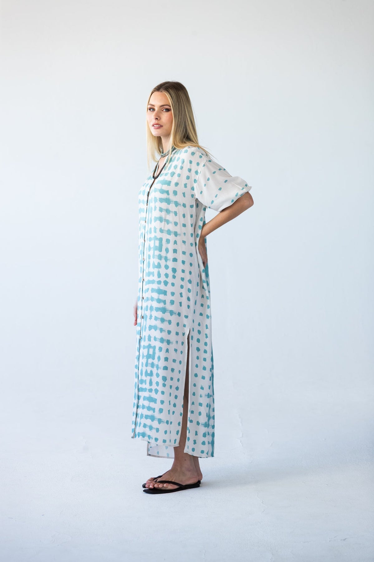 Bailey teal brushstroke kaftan, side profile view