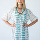 Bailey teal brushstroke kaftan, close-up of collar and neckline