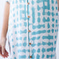 Bailey teal brushstroke kaftan, close-up of button placket and print detail