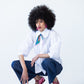 Claire frill shirt, crouching front view with neck scarf and wide-leg denim pants