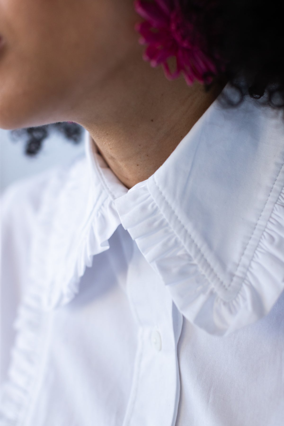 Claire frill shirt, side close-up of frilled collar and topstitching