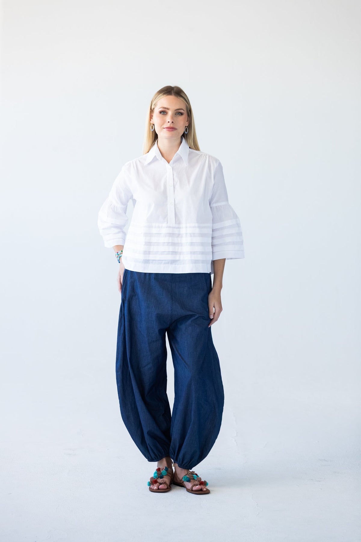 Serafina white pintuck shirt, front view full length styled with Stella Balloon Pants