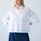 Serafina white pintuck shirt, back view close up showing gathered shoulder and sleeve