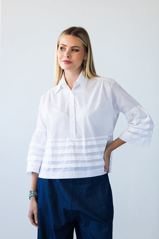 Serafina white cotton voile pintuck shirt, front view close up looking to the side