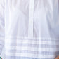 Serafina white pintuck shirt, close up of hem pintuck band and sleeve cuff detail