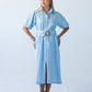 Harlow blue and white stripe shirt dress, front view with self-tie belt and showing puff sleeves in full