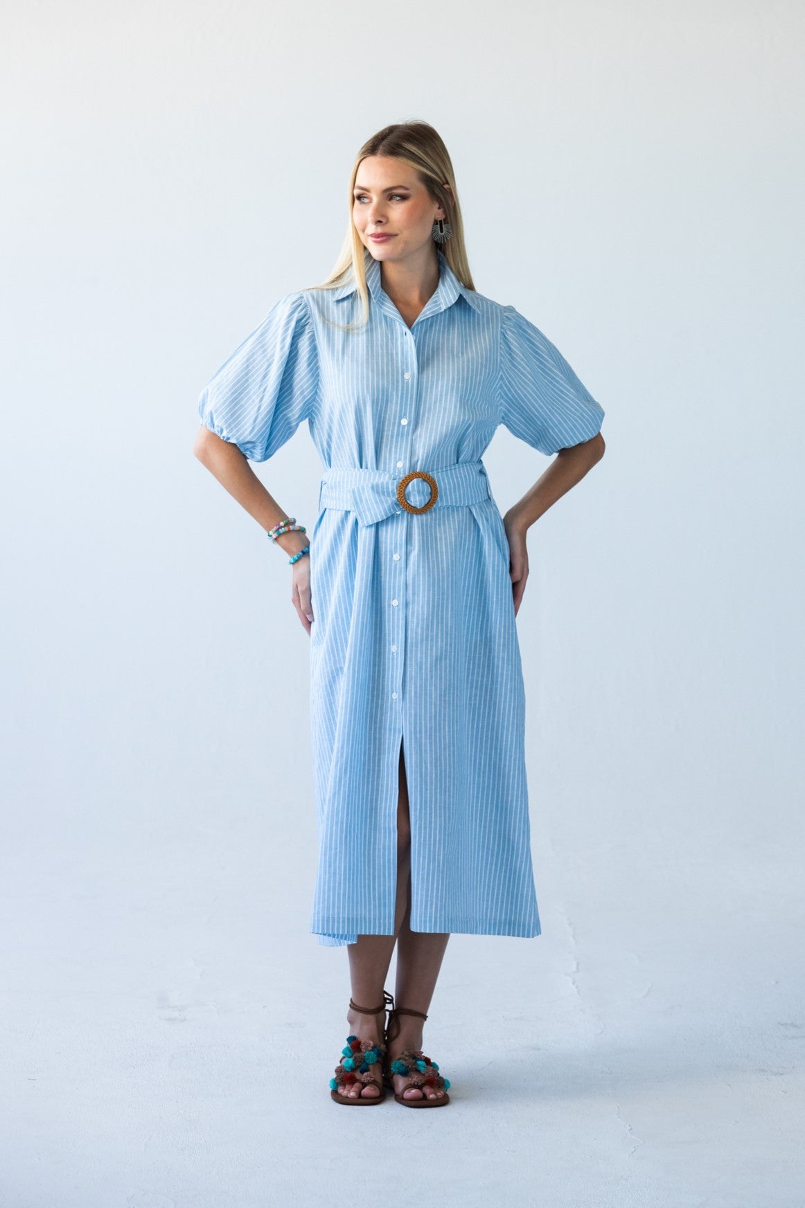 Harlow blue and white stripe shirt dress, front view with self-tie belt and showing puff sleeves in full