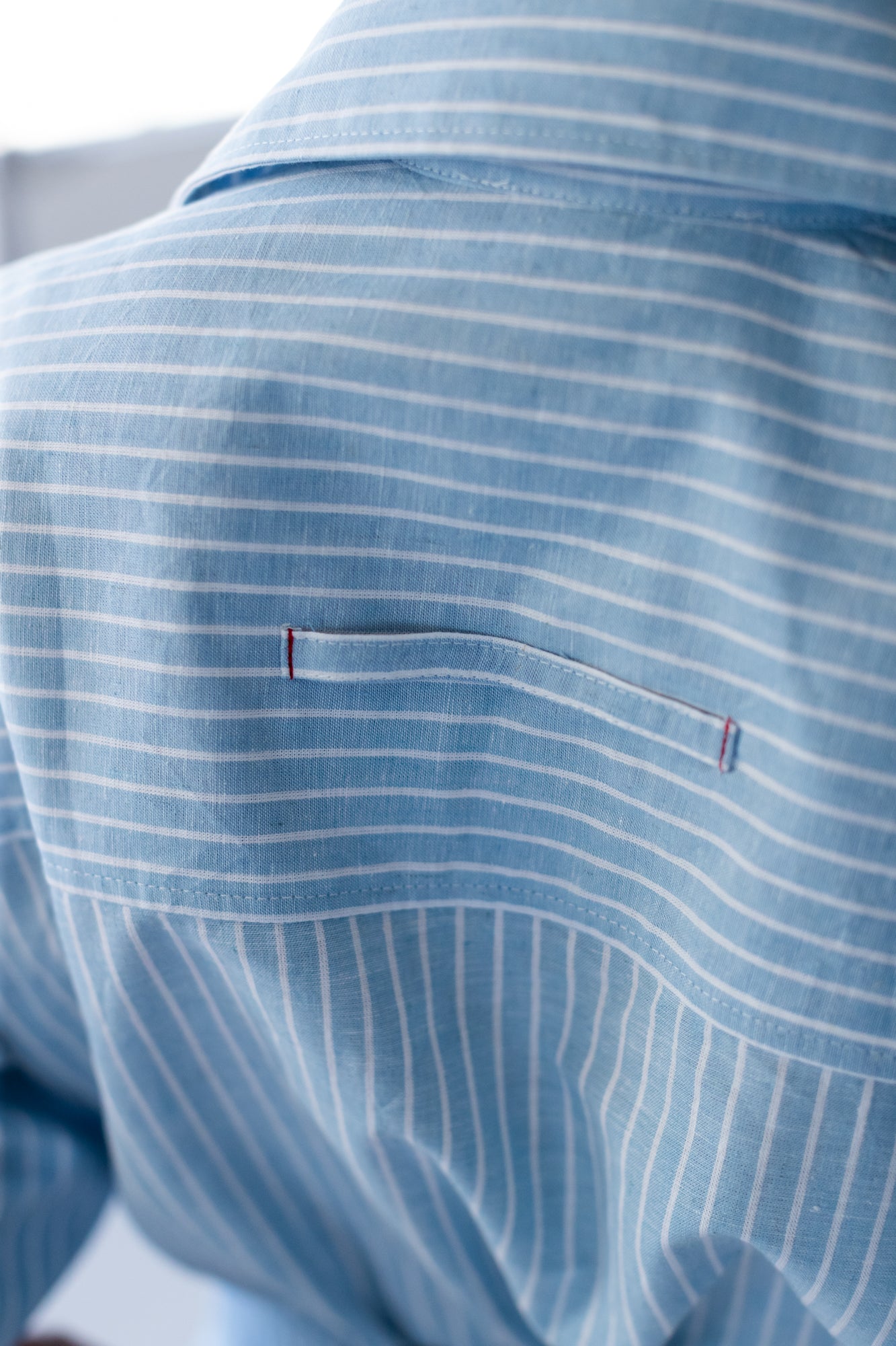 Harlow blue and white stripe shirt dress, close up of back tab detail