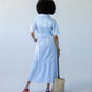 Frankie blue check dress, back view with tied belt