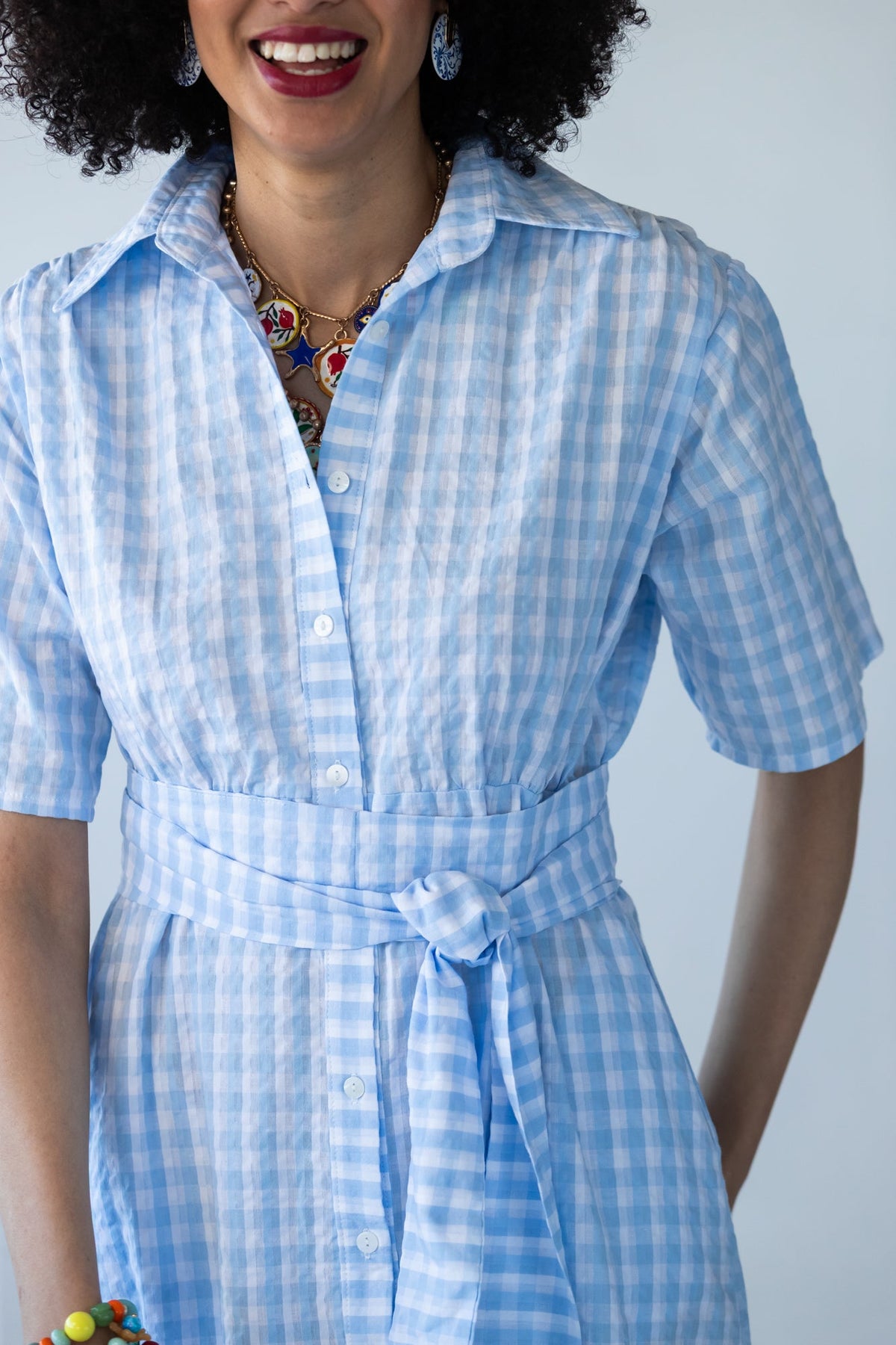 Frankie blue check dress, close-up of collar with model smiling