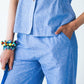 Reese stripe shirt, close up of waist and hand in pocket