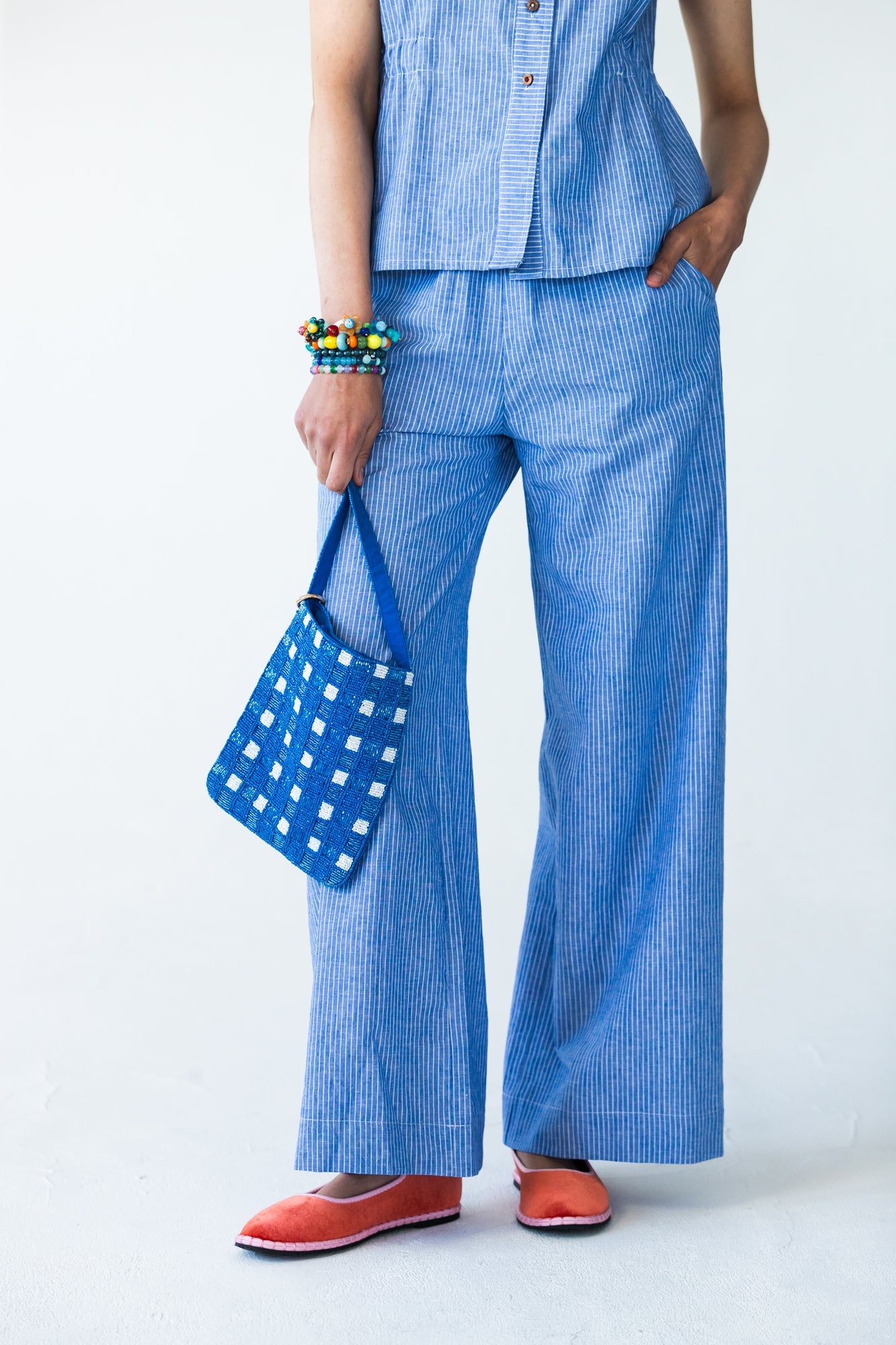 Sydney wide leg stripe pants, close up front view showing pocket