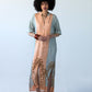 Bailey peach and pale blue symmetrical stripe kaftan, front view showing palm print hem
