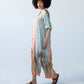 Bailey peach and pale blue symmetrical stripe kaftan, side view showing palm print hem