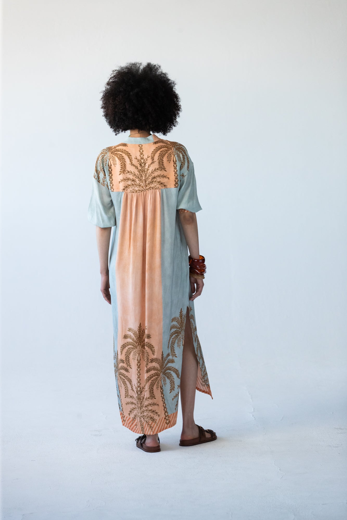 Bailey kaftan, back view showing gathered yoke with palm print detail
