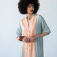 Bailey kaftan, close up front view showing button placket and symmetrical stripe