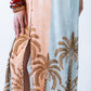 Bailey kaftan, close up of front slit and palm print hem detail