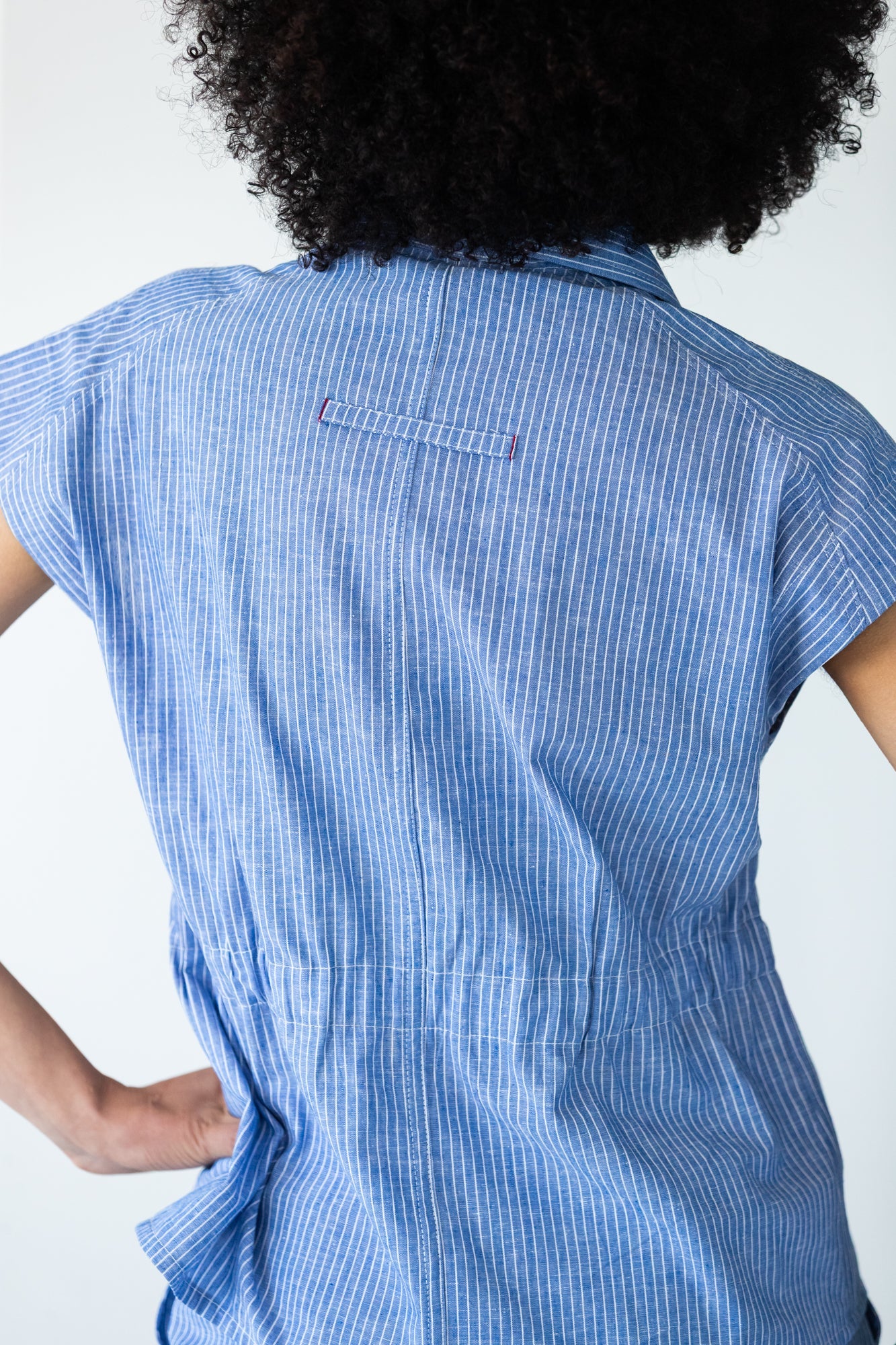Reese stripe shirt, back view showing loop tab and elasticated seam
