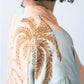 Bailey kaftan, back side view showing gathered yoke with palm print detail