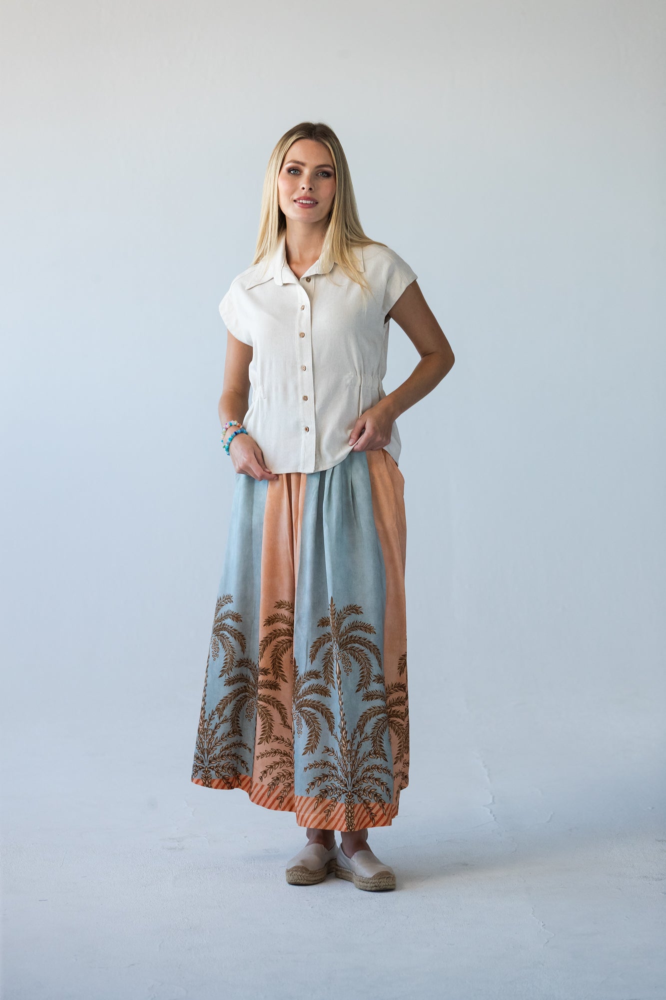 Sorrento stripe palm print skirt, front view with hands on hips