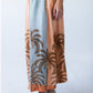 Sorrento stripe palm print skirt, close up of palm print hem detail