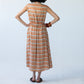 Sutton orange check shirt-dress, full-length back view showing yoke and elasticated waist
